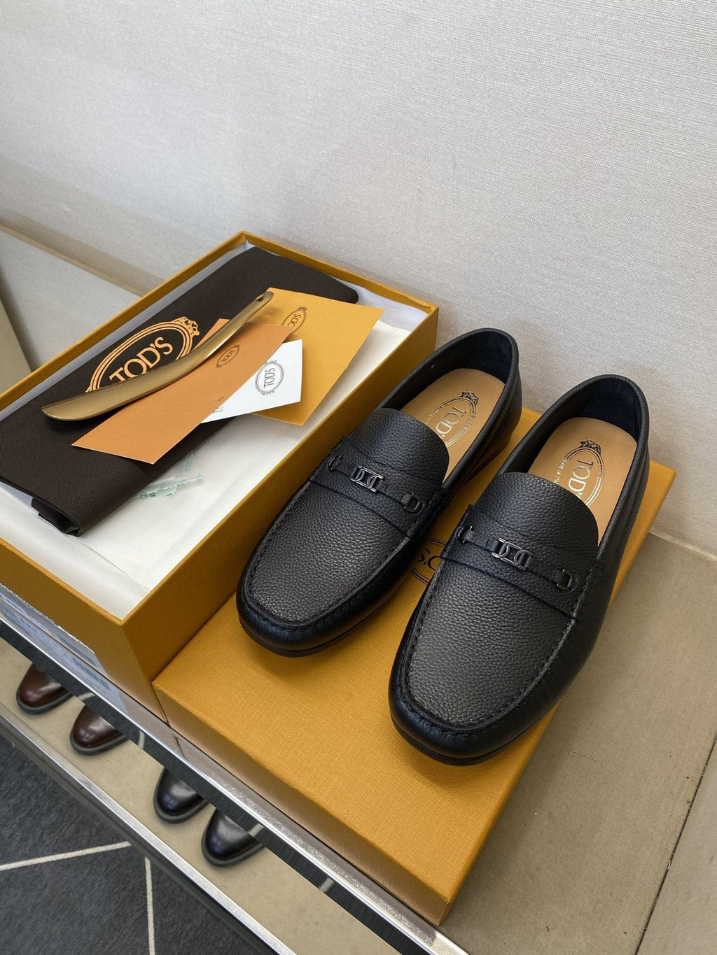 Tod's Black Leather Penny Loafers